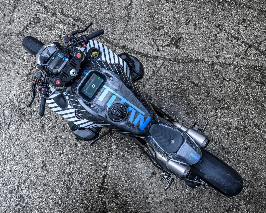 BMW’s custom R 1300 R Titan skips the showroom and hits the track: fully carbon-clad, nitrous-injected, and sprint-ready with no comfort compromises.