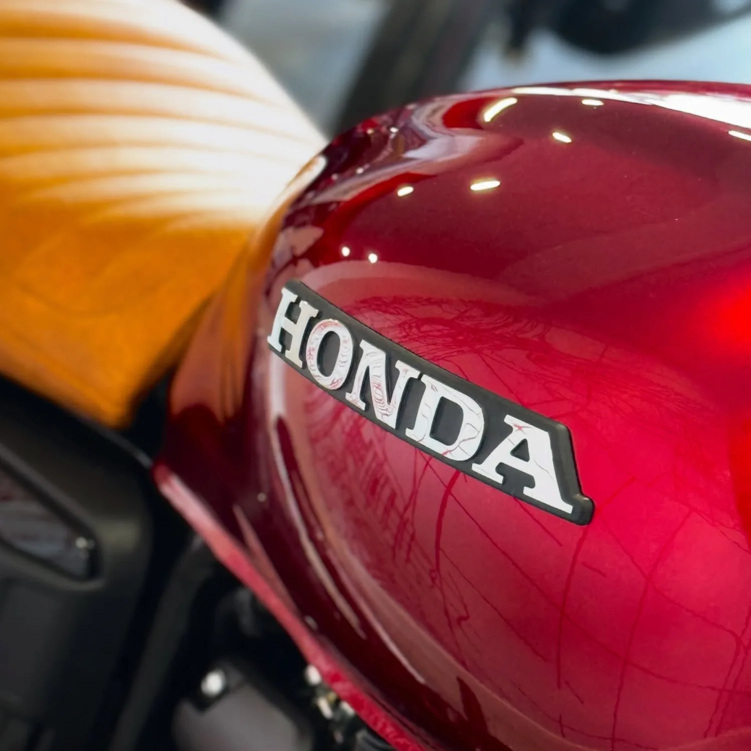 Doble Motorcycles has transformed the Honda GB350S into a stunning custom creation with a unique Candy Toffee Apple Red tank and leather seat. A beautiful blend of retro styling and modern tech.