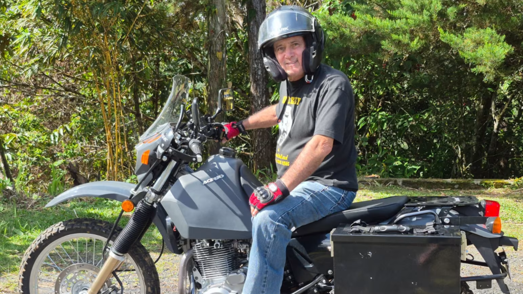 Steven Barnett, 77, sets out on a 50,000-mile motorcycle journey across 27 countries to become the oldest rider to circle the globe.
