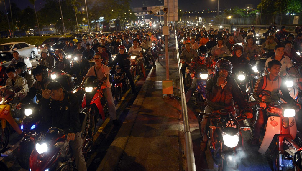 Singapore introduces facial recognition at motorcycle lanes to speed up border clearance, replacing fingerprint checks at Woodlands and Tuas checkpoints.