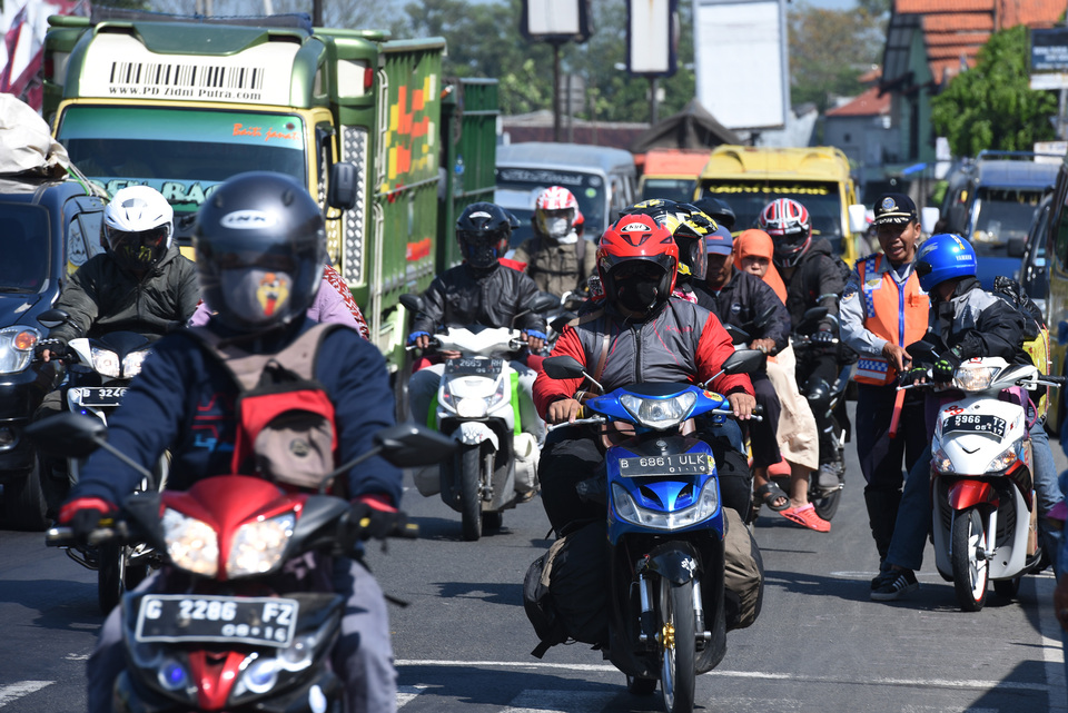 Indonesia plans to convert millions of motorcycles to electric, aiming for energy independence, but faces major challenges in infrastructure, cost and public adoption.